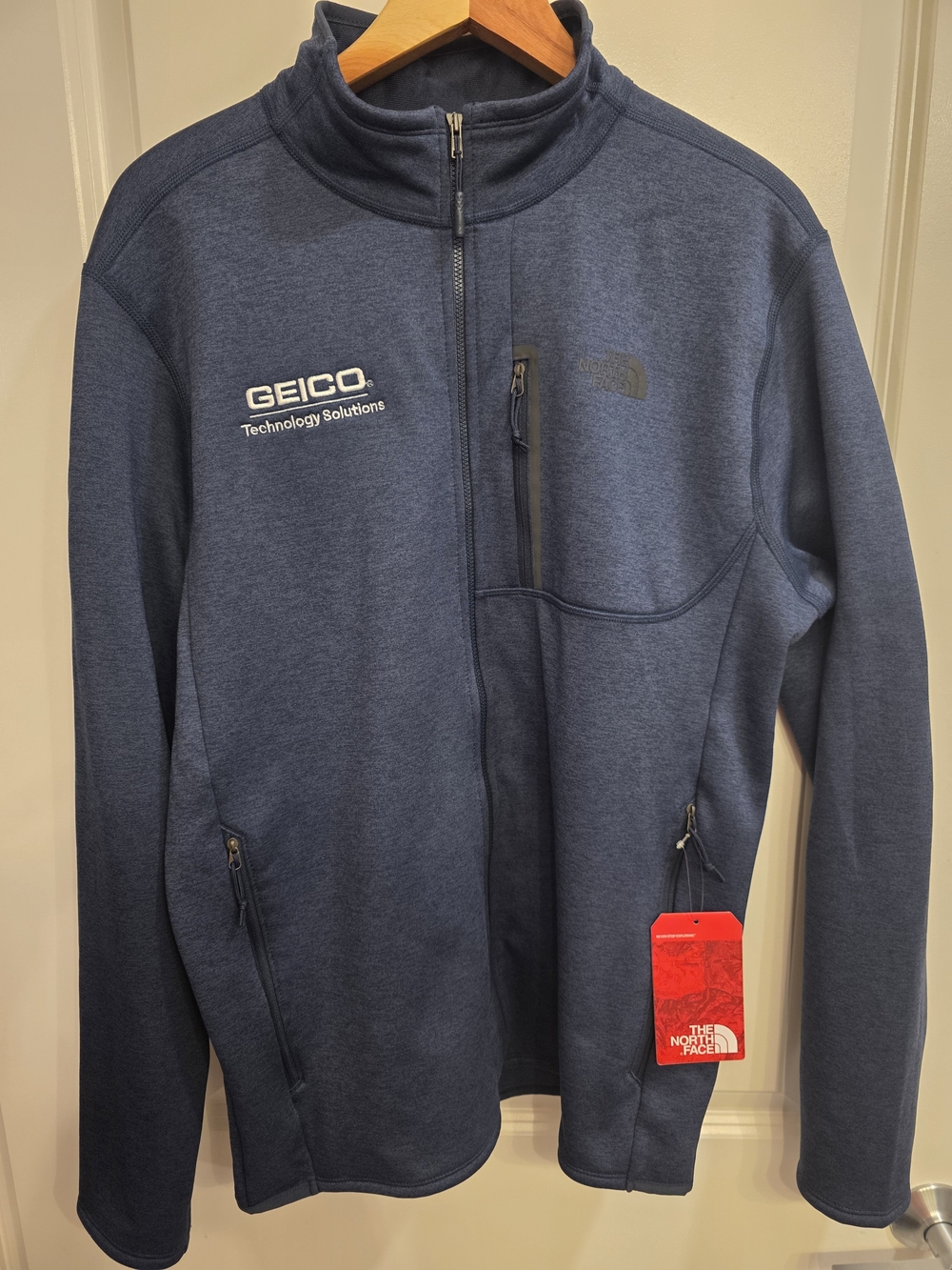 The North Face Men’s Navy Full-Zip Softshell Jacket - GEICO Logo